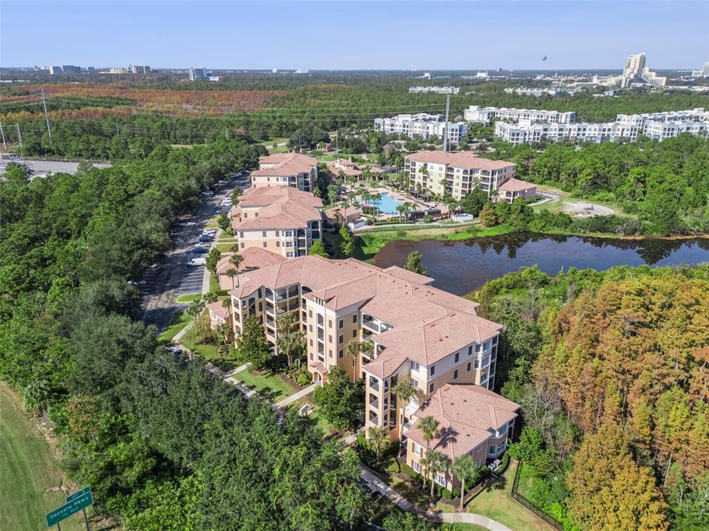 8801 Worldquest Boulevard, Unit 4108 Orlando, FL 32821 - Photo 34 of 85 an aerial view of a city with lake view