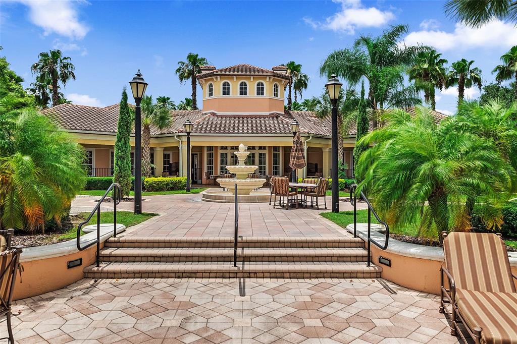 8801 Worldquest Boulevard, Unit 4108 Orlando, FL 32821 - Photo 85 of 85 a front view of a house with yard and green space