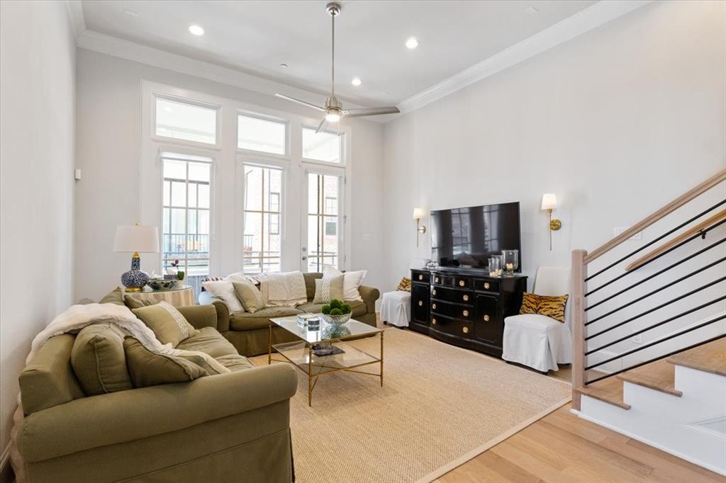 4129 Runyon Road Addison, TX 75001 - Photo 13 of 38 Living area with a ceiling fan, wood finished floors, a high ceiling, ornamental molding, and recessed lighting