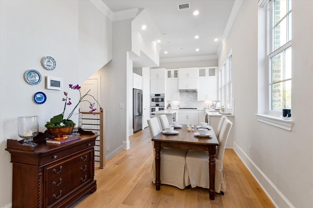 4129 Runyon Road Addison, TX 75001 - Photo 14 of 38 Dining space with ornamental molding, light wood-style floors, and recessed lighting