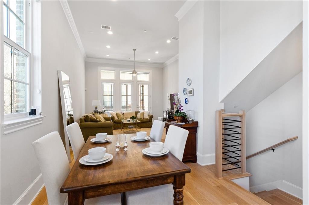 4129 Runyon Road Addison, TX 75001 - Photo 15 of 38 Dining space with crown molding, light wood-style floors, and recessed lighting