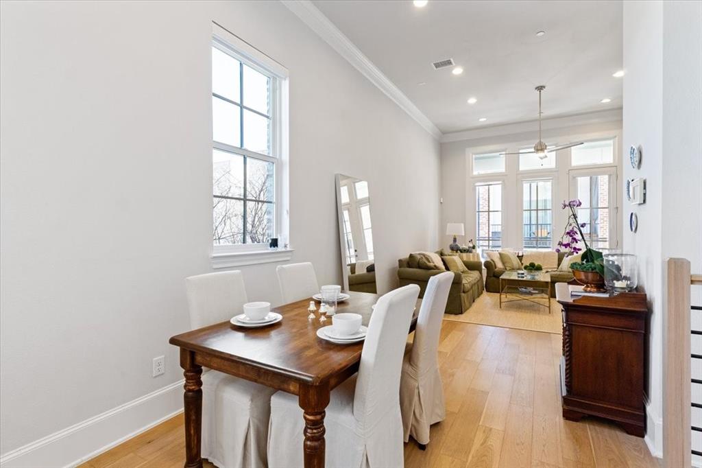4129 Runyon Road Addison, TX 75001 - Photo 16 of 38 Dining space featuring light wood finished floors, ornamental molding, and recessed lighting