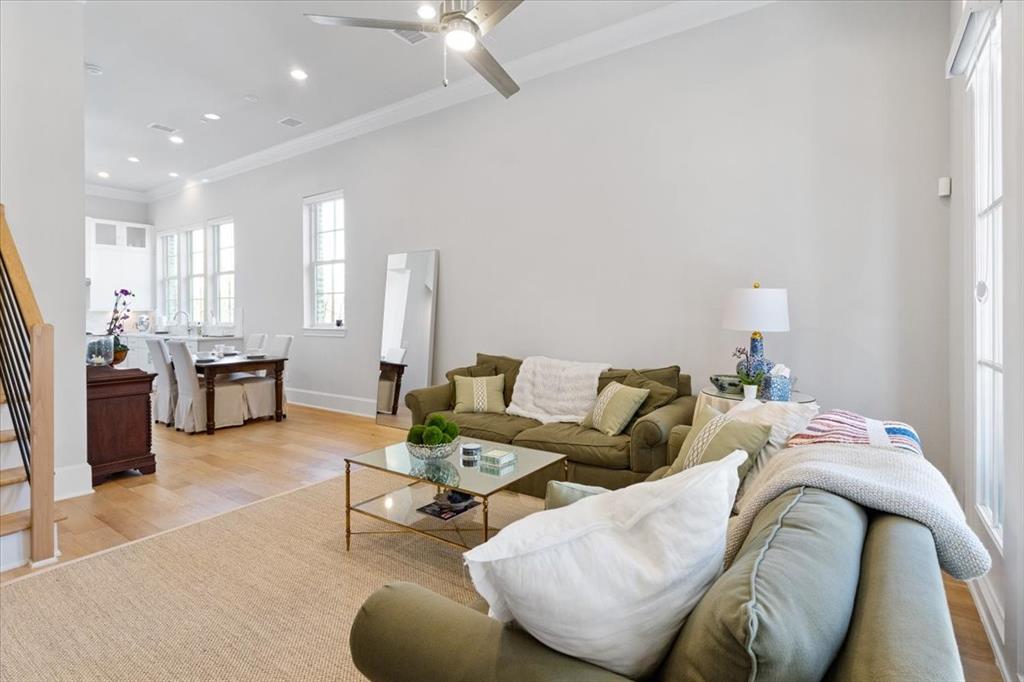 4129 Runyon Road Addison, TX 75001 - Photo 18 of 38 Living room with light wood-style floors, ceiling fan, recessed lighting, and crown molding