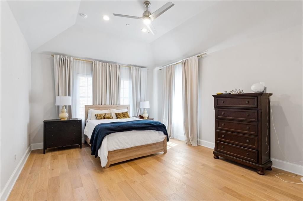 4129 Runyon Road Addison, TX 75001 - Photo 23 of 38 Bedroom with recessed lighting, vaulted ceiling, light wood-style floors, and a ceiling fan