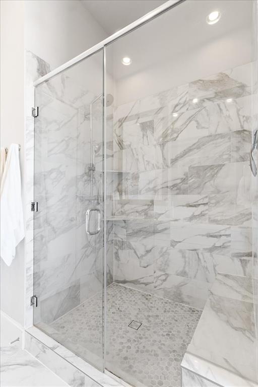 4129 Runyon Road Addison, TX 75001 - Photo 27 of 38 Full bathroom featuring a marble finish shower