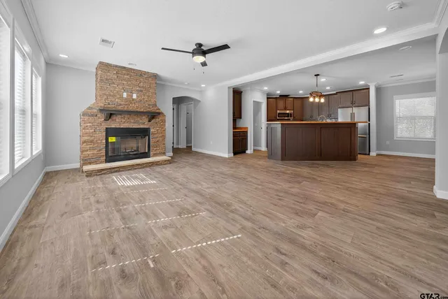 a view of a livingroom with a fireplace
