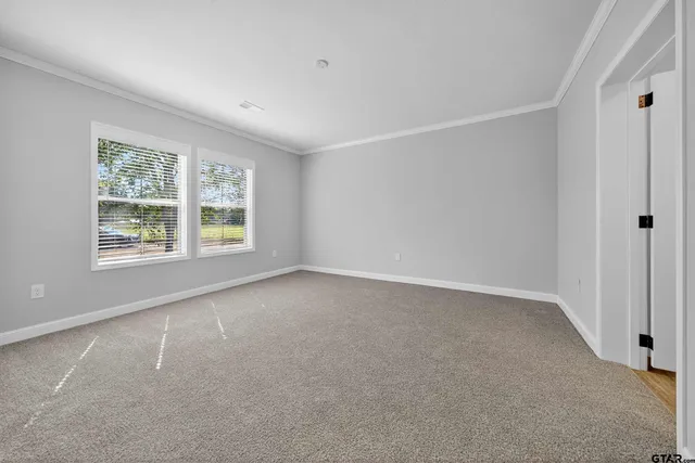 a view of a road with a yard