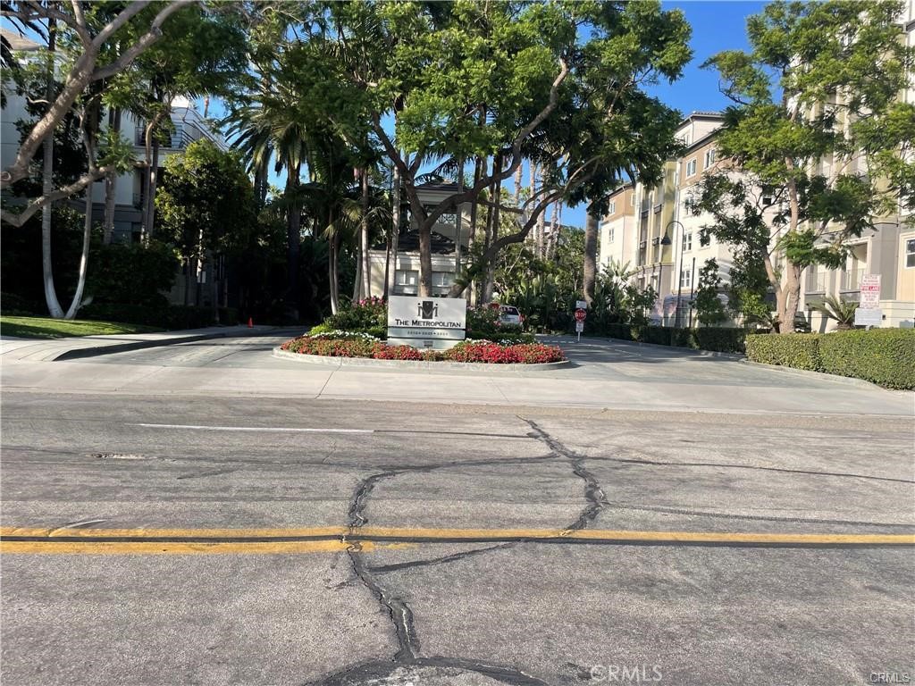 2243 Martin, Unit 117 Irvine, CA 92612 - Photo 1 of 16 a view of street along with trees