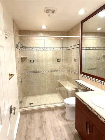 a bathroom with a shower and a bathtub