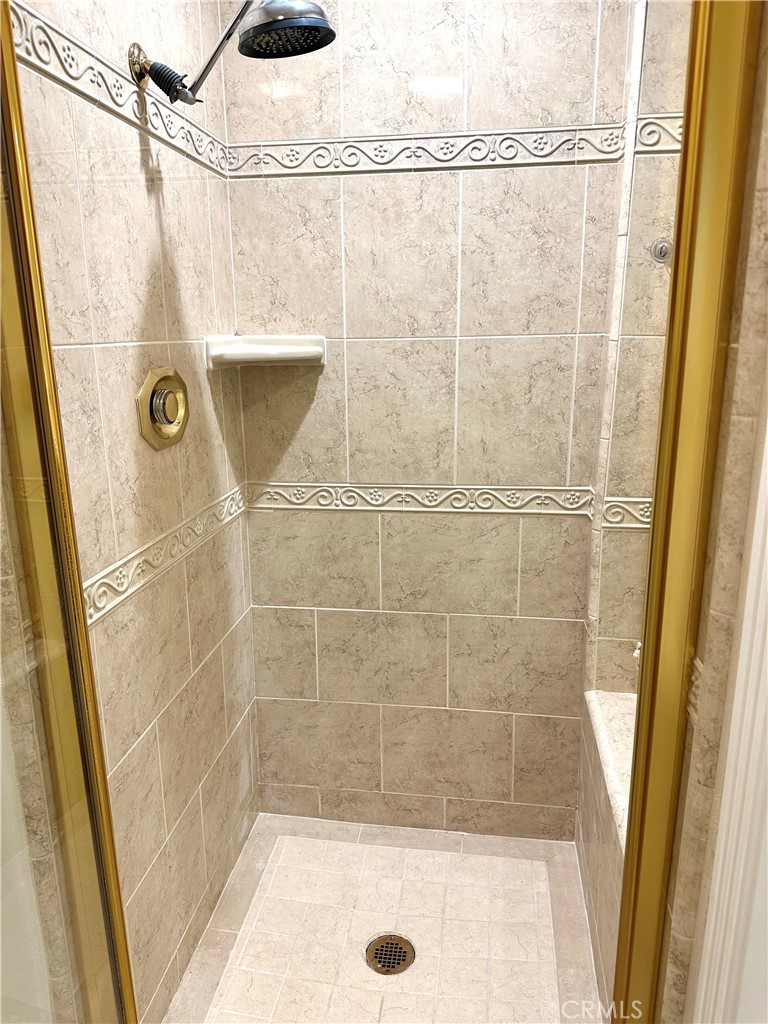 2243 Martin, Unit 117 Irvine, CA 92612 - Photo 14 of 16 a bathroom with a shower