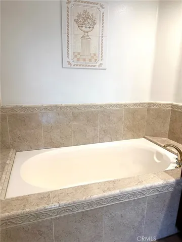 a view of a bathtub in a bathroom
