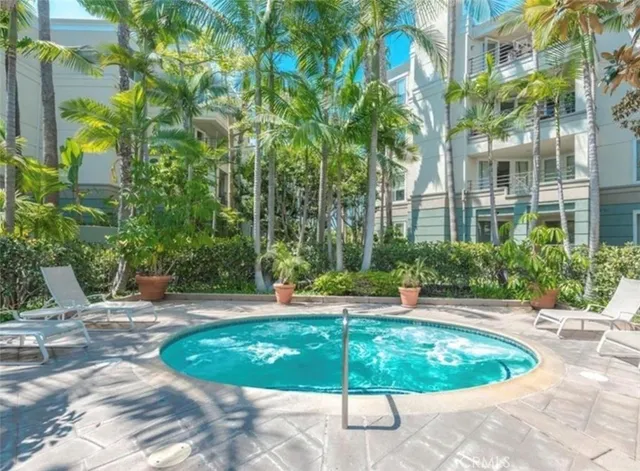 a view of a swimming pool with a patio