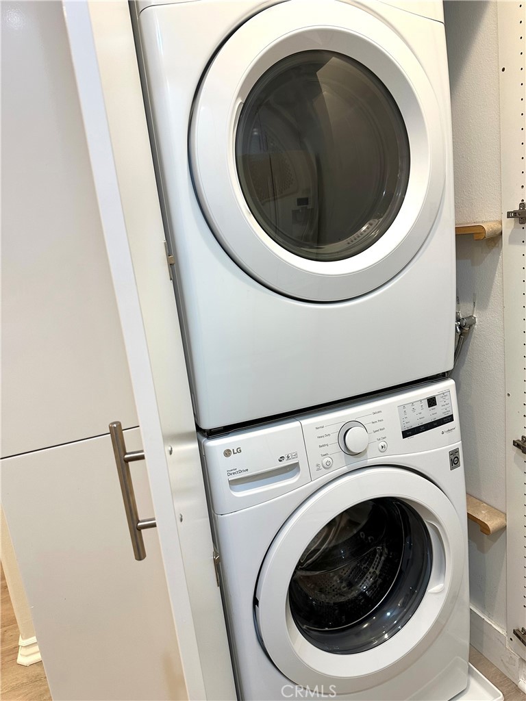 2243 Martin, Unit 117 Irvine, CA 92612 - Photo 9 of 16 a utility room with dryer and washer