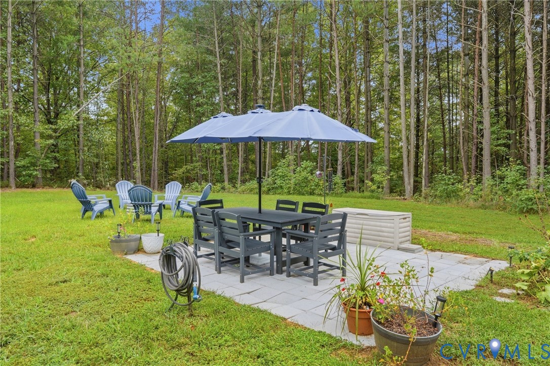 3741 Boundary Run Road Gum Spring, VA 23065 - Photo 31 of 36 Expansive green lawn with a stone paver patio and