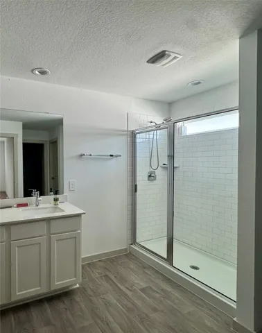 a park view of a bench in the patio