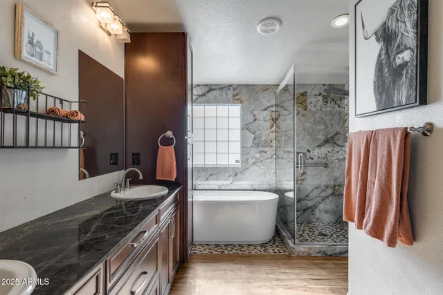 a view of kitchen with cabinets and wooden floor