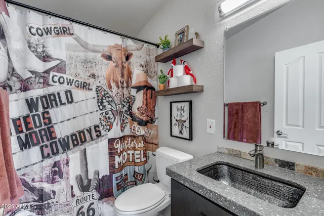 a view of a backyard with swimming pool and furniture