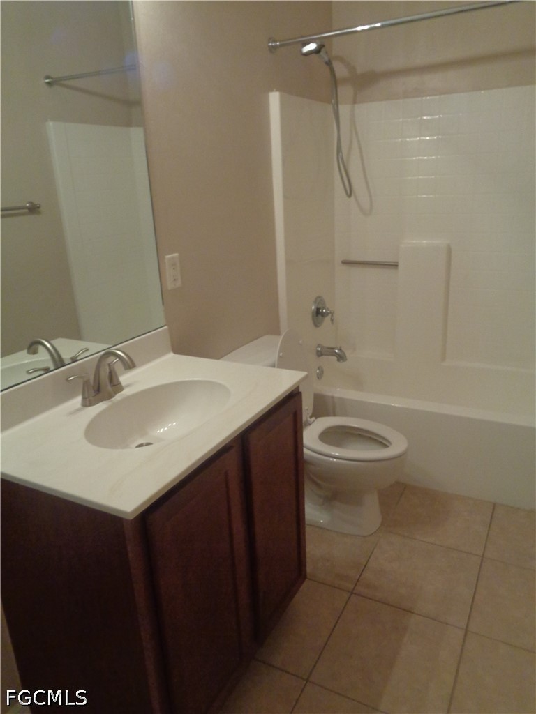 2463 Nature Pointe Loop Fort Myers, FL 33905 - Photo 33 of 50 a bathroom with a sink a toilet and shower