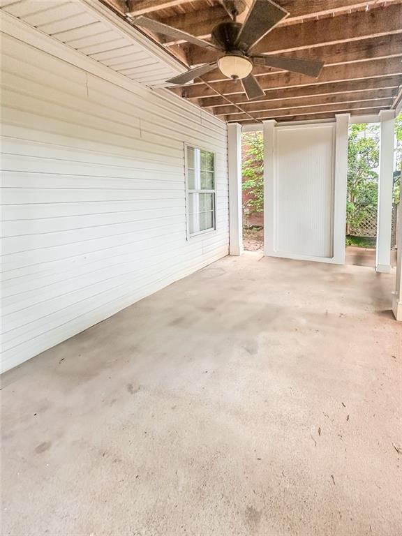 1485 Oglethorpe Run Lane Suwanee, GA 30024 - Photo 17 of 18 a view of an empty room with a window