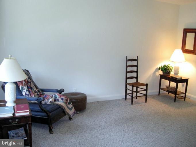328 Stanmore Road Baltimore, MD 21212 - Photo 9 of 20 Freshly painted living room w/abundant light