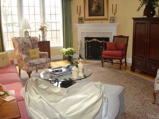 3503 Proprietor Way Raleigh, NC 27612 - Photo 2 of 12 a living room with furniture and a fireplace