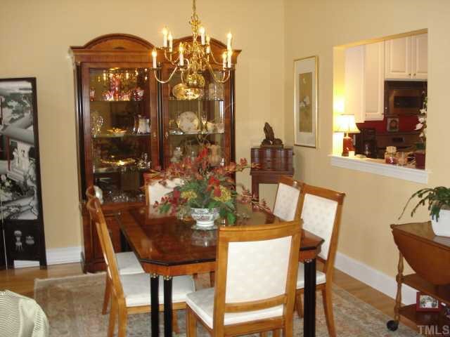 3503 Proprietor Way Raleigh, NC 27612 - Photo 4 of 12 a view of a dining room with furniture and wooden floor