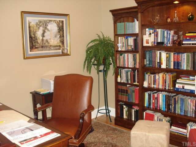 3503 Proprietor Way Raleigh, NC 27612 - Photo 6 of 12 a view of a workspace with bookshelf
