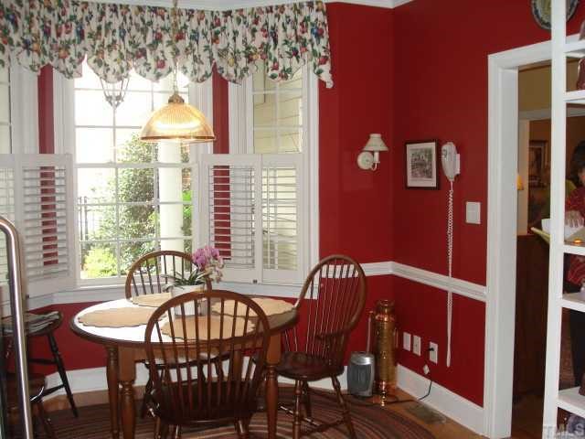 3503 Proprietor Way Raleigh, NC 27612 - Photo 8 of 12 a view of a dining room with furniture window and outside view