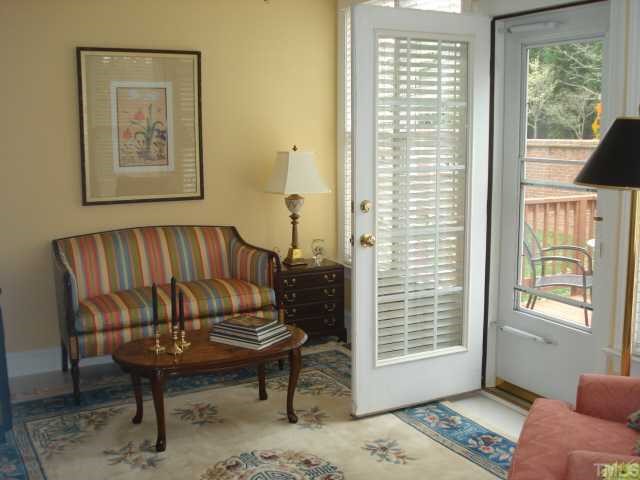 3503 Proprietor Way Raleigh, NC 27612 - Photo 10 of 12 a living room with a couch and a window