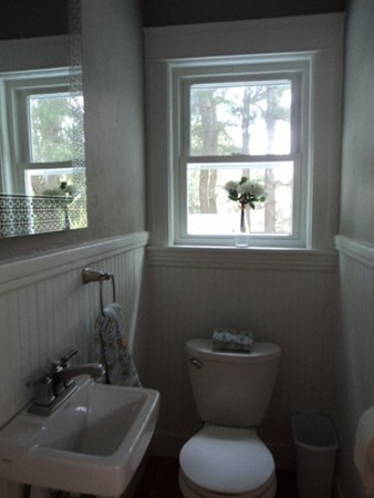 63 Hadwen Road Worcester, MA 01602 - Photo 15 of 29 a bathroom with a toilet sink and mirror