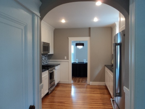63 Hadwen Road Worcester, MA 01602 - Photo 7 of 29 a kitchen with a refrigerator and a sink