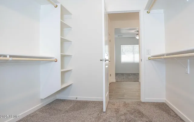 a view of an empty walk in closet