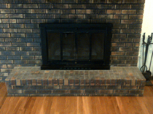 1730 Good Avenue Park Ridge, IL 60068 - Photo 12 of 24 a living room with a fireplace