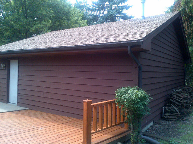 1730 Good Avenue Park Ridge, IL 60068 - Photo 20 of 24 a wooden bench sitting in front of a house