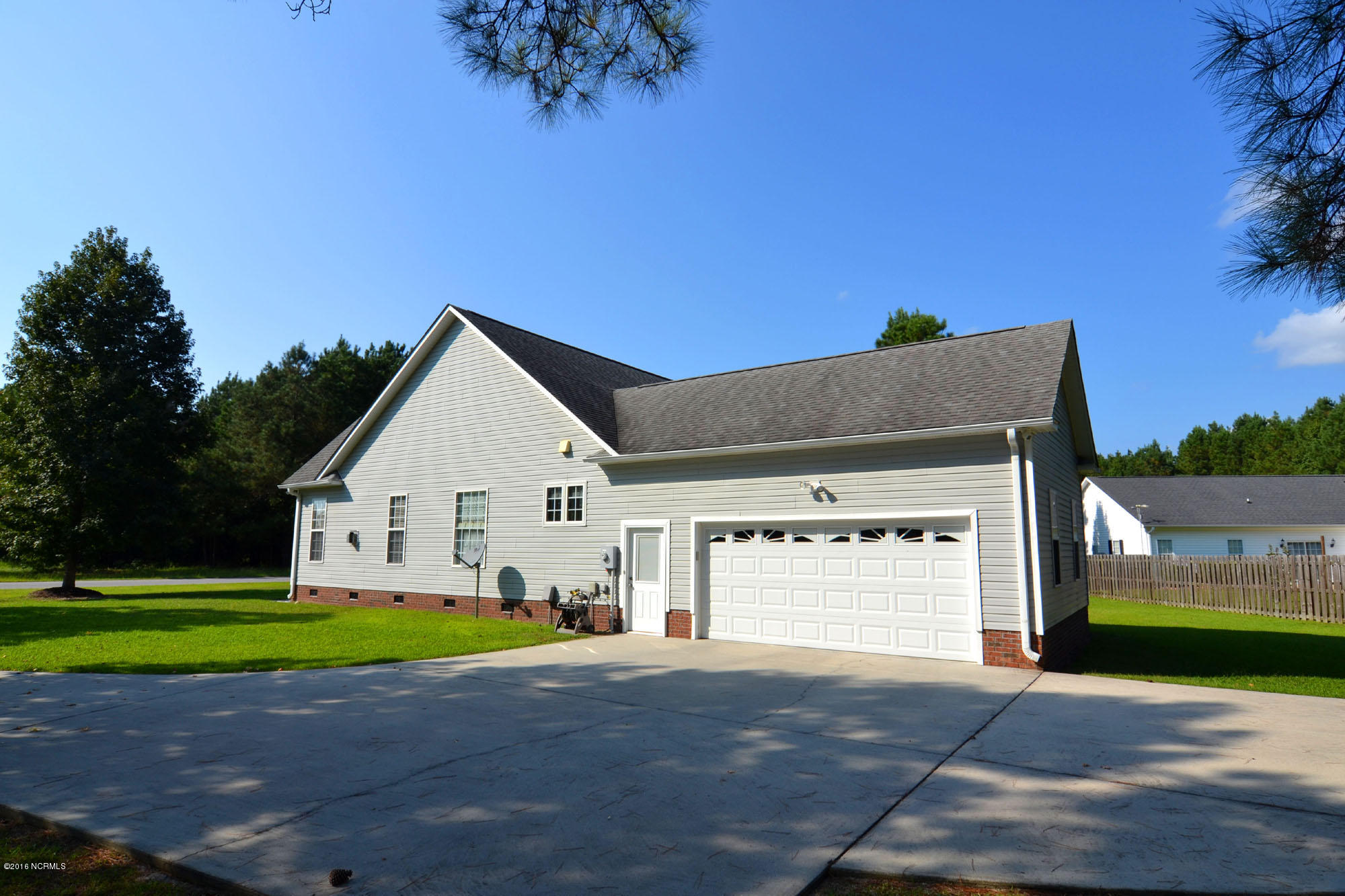 448 Winding Creek Road Rocky Point, NC 28457 - Photo 29 of 30 side of home garage