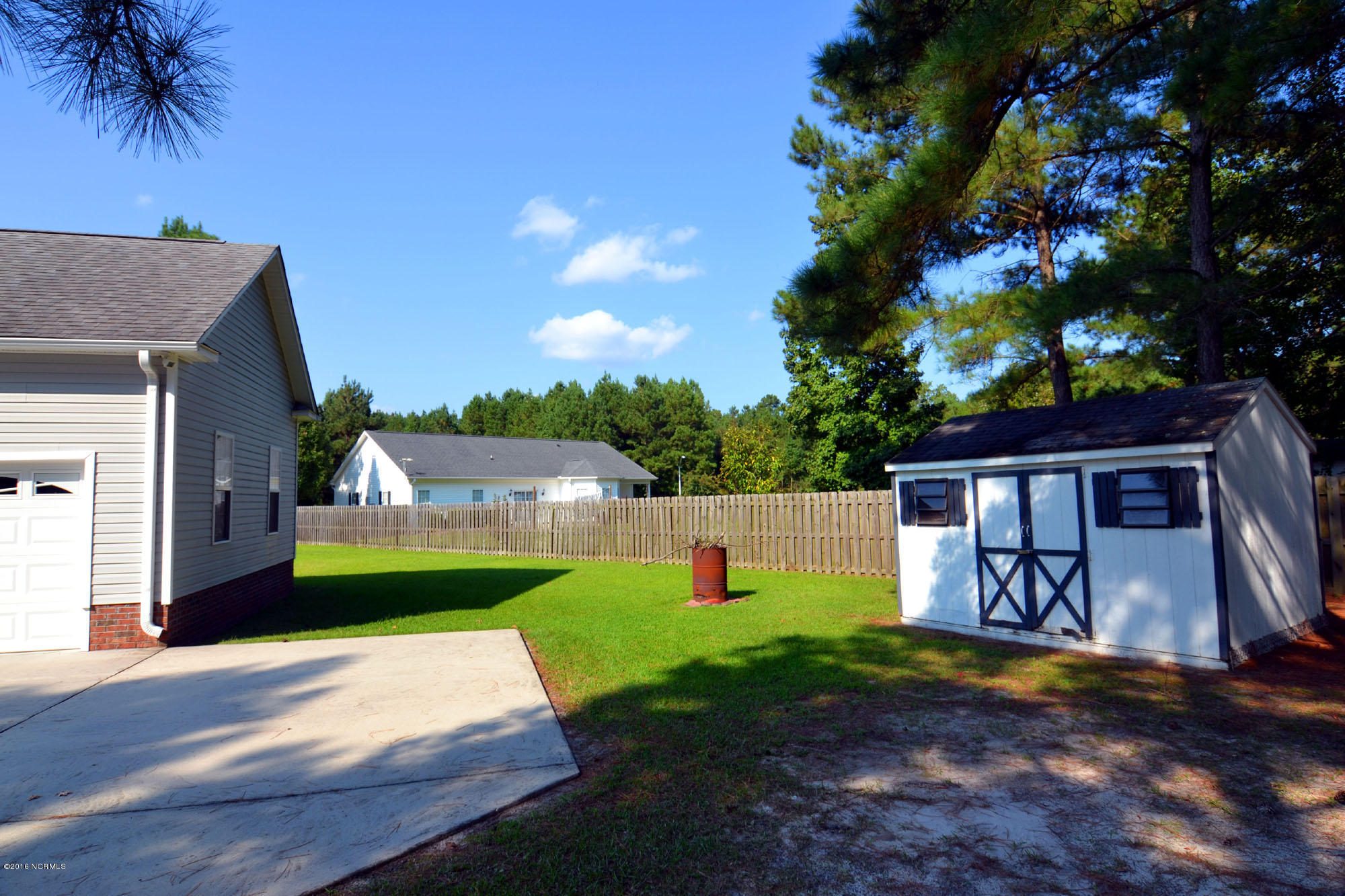 448 Winding Creek Road Rocky Point, NC 28457 - Photo 30 of 30 side of home shed