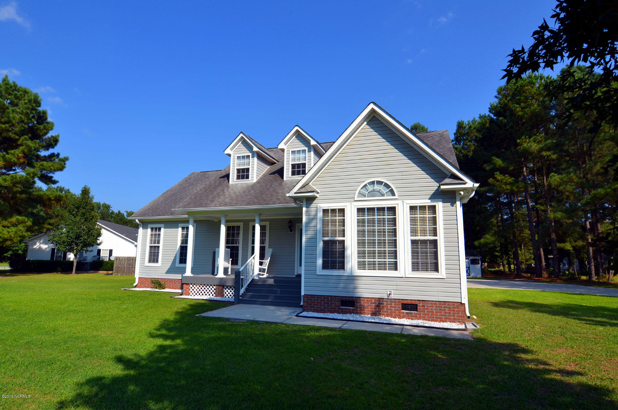 448 Winding Creek Road Rocky Point, NC 28457 - Photo 4 of 30 front of home shadow