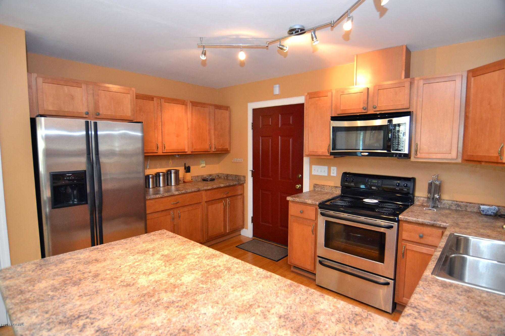 448 Winding Creek Road Rocky Point, NC 28457 - Photo 7 of 30 kitchen from back