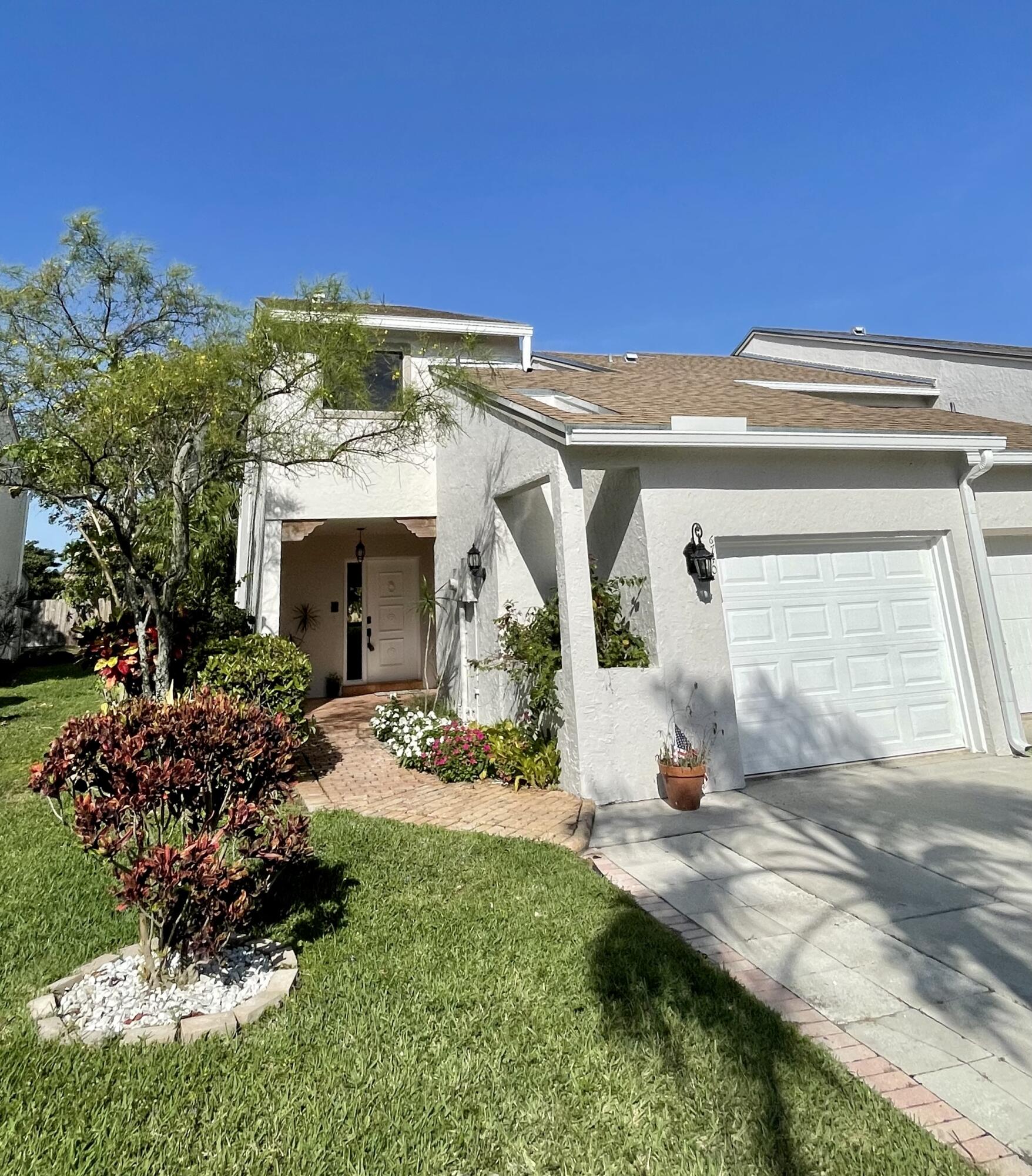 6740 Canary Palm Circle Boca Raton, FL 33433 - Photo 1 of 21 4FA7A795-2CE2-4F95-A8BD-A1069C792F3C