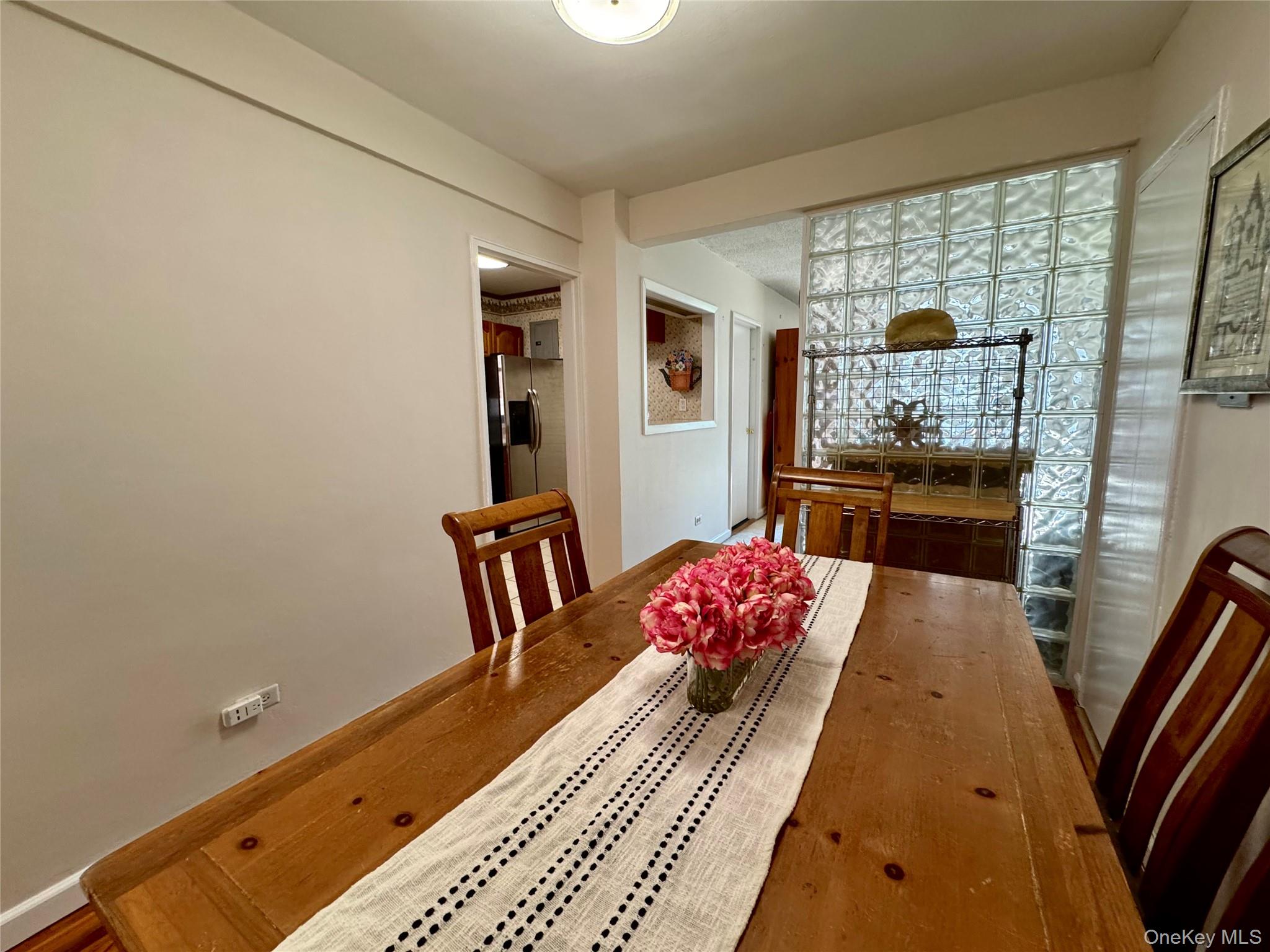 139-15 83rd Avenue, Unit 409 Queens, NY 11435 - Photo 13 of 38 a living room with furniture