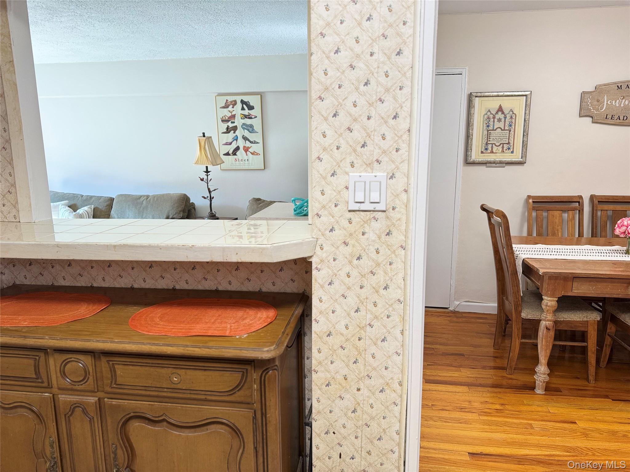 139-15 83rd Avenue, Unit 409 Queens, NY 11435 - Photo 21 of 38 a view of a livingroom with furniture and staircase
