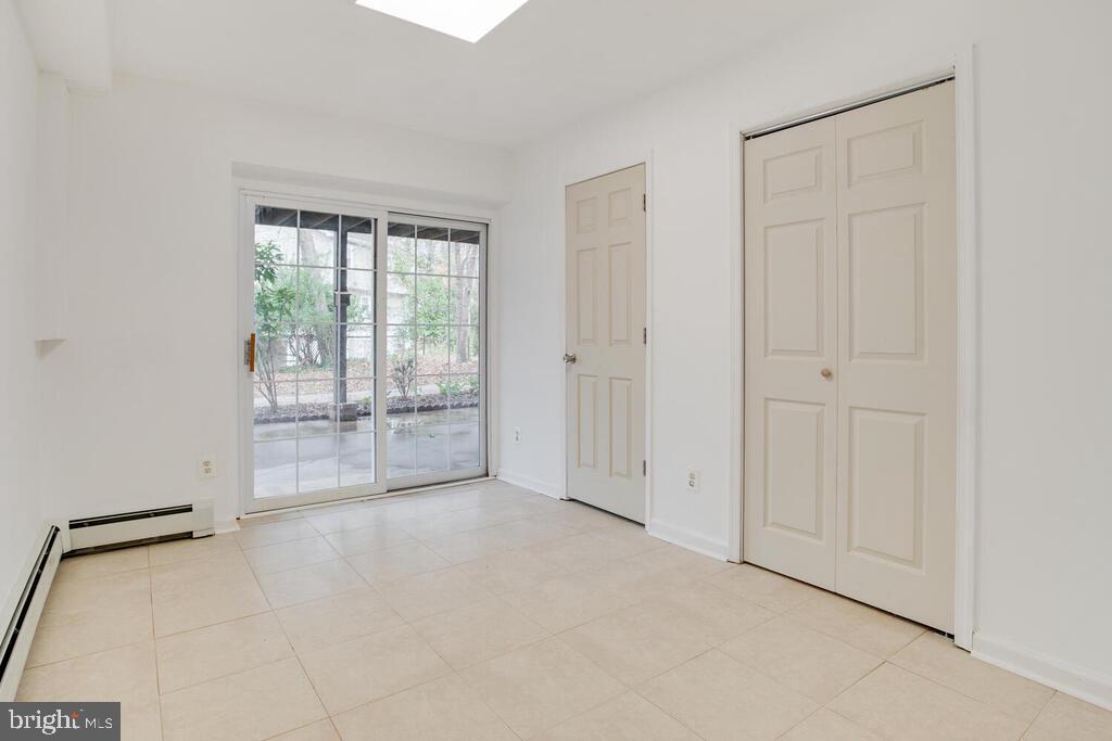 936 Grace Road Huntingtown, MD 20639 - Photo 44 of 64 an empty room with windows