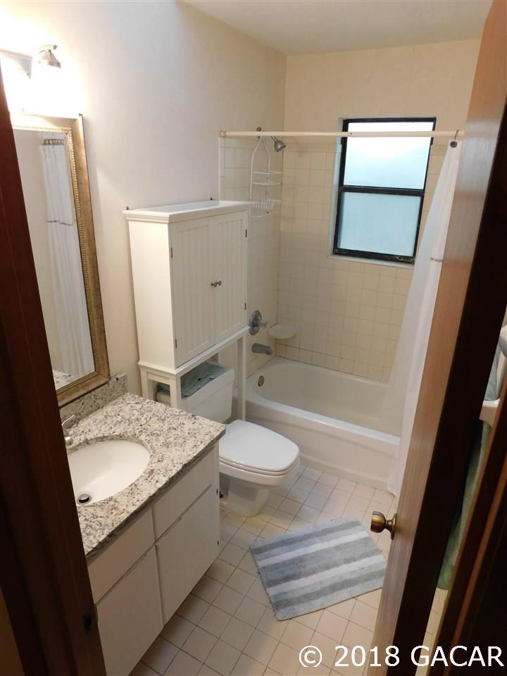 1710 Southwest 78th Street Gainesville, FL 32607 - Photo 11 of 30 Main Bathroom Looking South