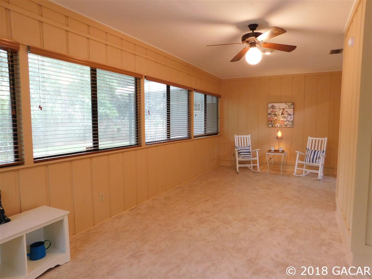 1710 Southwest 78th Street Gainesville, FL 32607 - Photo 15 of 30 Enclosed Porch on West side Looking North