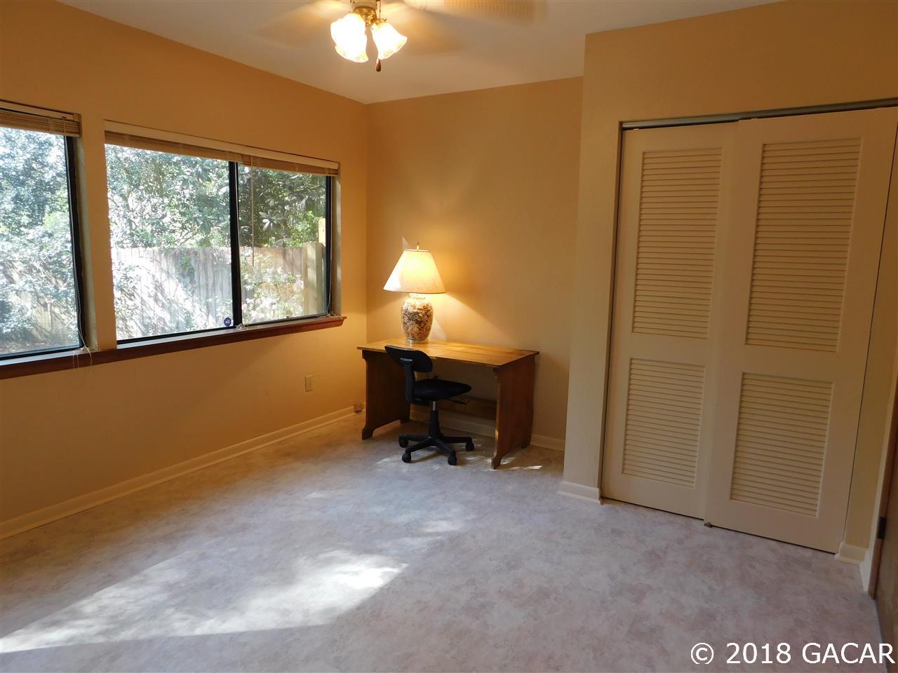 1710 Southwest 78th Street Gainesville, FL 32607 - Photo 16 of 30 Guest Bedroom Located West of Garage