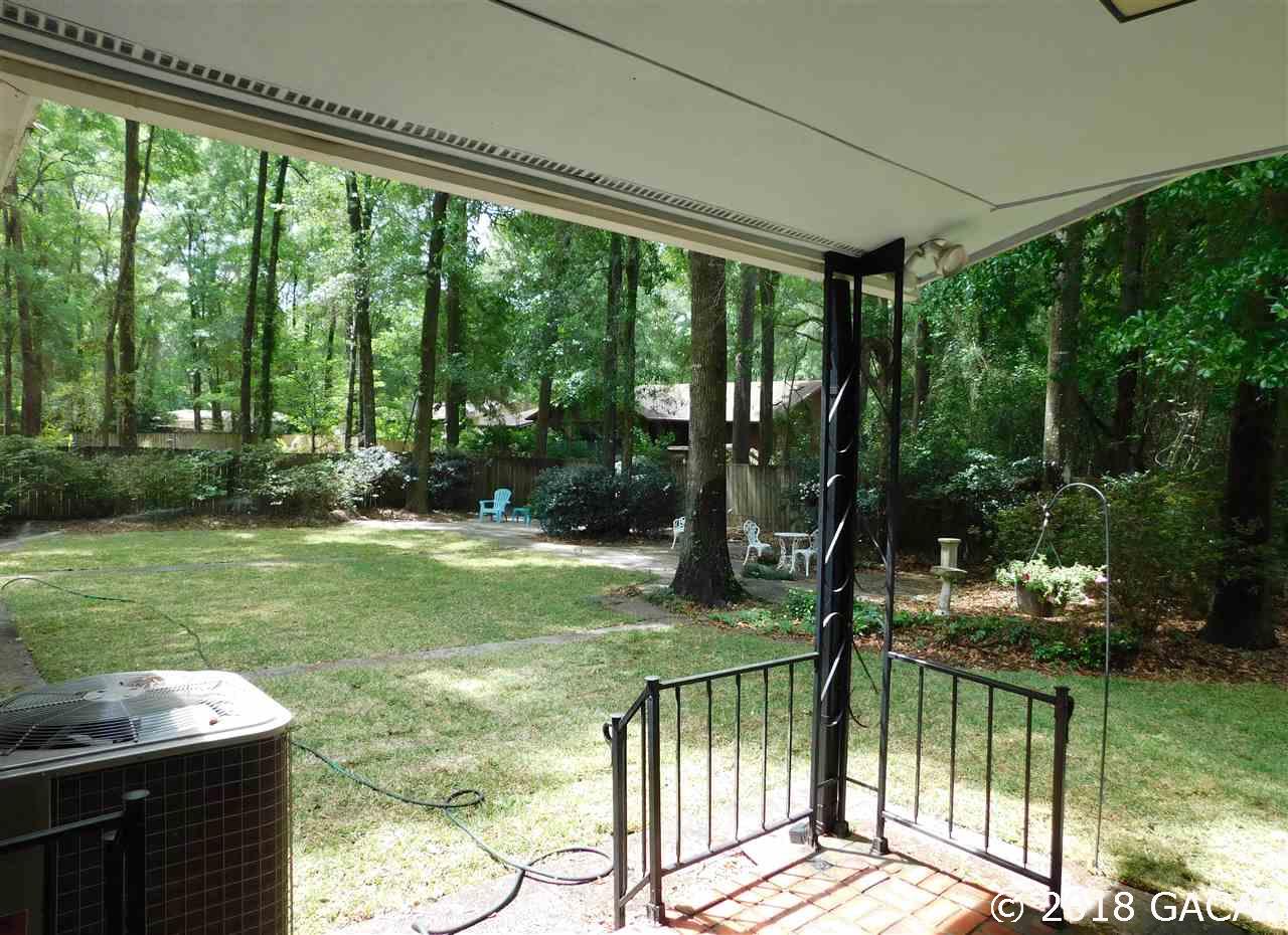 1710 Southwest 78th Street Gainesville, FL 32607 - Photo 21 of 30 Covered Open Porch off Guest Bedroom/Studio