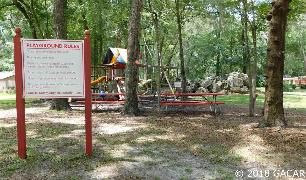 1710 Southwest 78th Street Gainesville, FL 32607 - Photo 22 of 30 Sunrise Playground Entrance & Rules