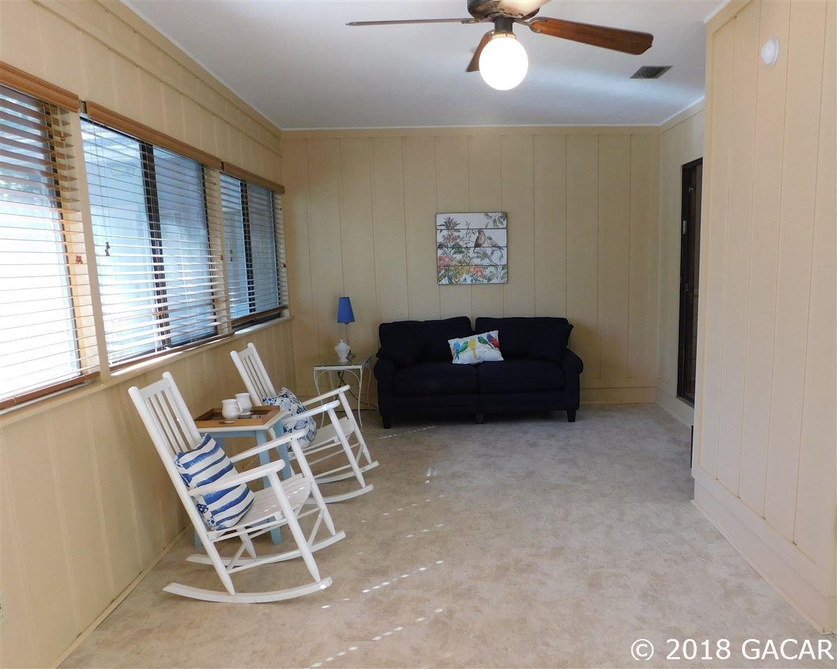 1710 Southwest 78th Street Gainesville, FL 32607 - Photo 26 of 30 Enclosed Porch on West side Looking North