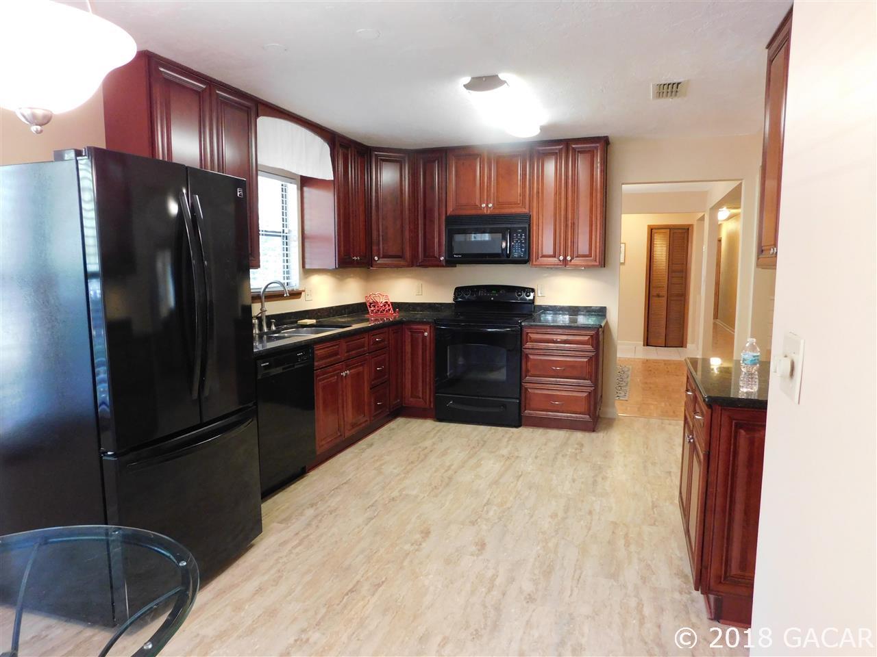 1710 Southwest 78th Street Gainesville, FL 32607 - Photo 6 of 30 Kitchen Looking Sounth