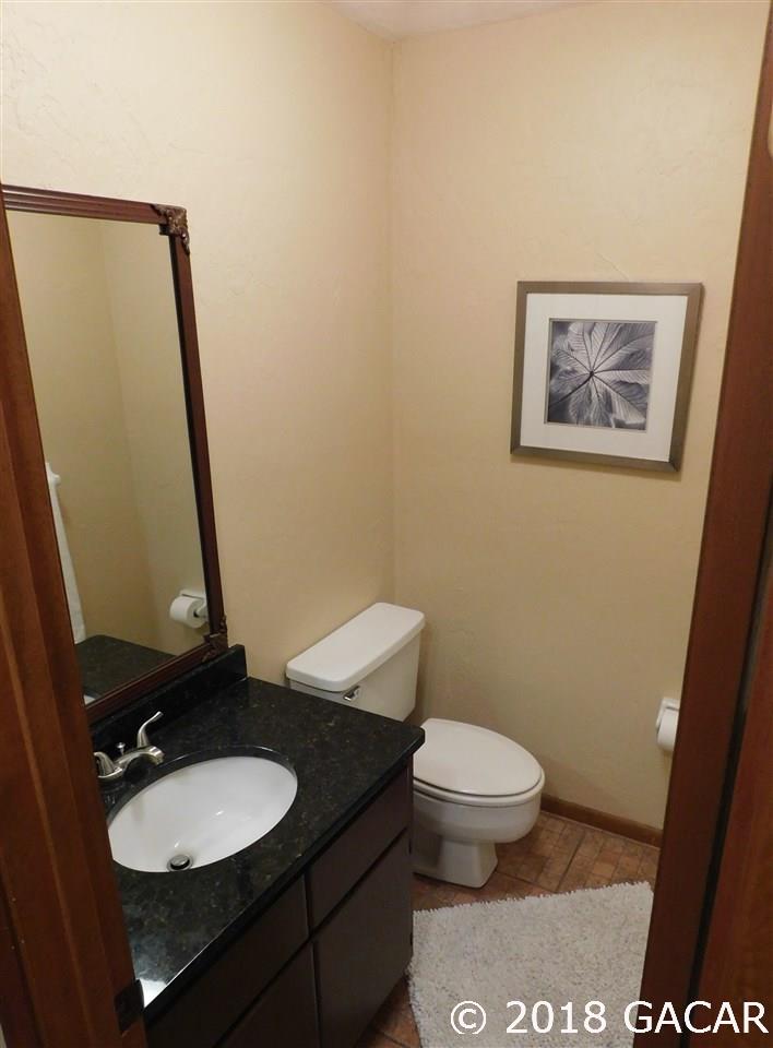 1710 Southwest 78th Street Gainesville, FL 32607 - Photo 9 of 30 Half Bath West of Utility Room